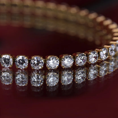 Diamond Bracelet for Women on a reflective surface with a blurred background