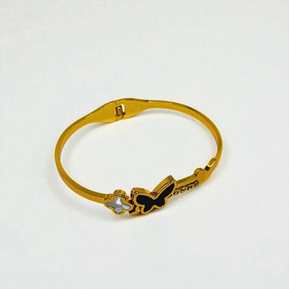 Gold Bracelet for Women with butterfly designs on a white background