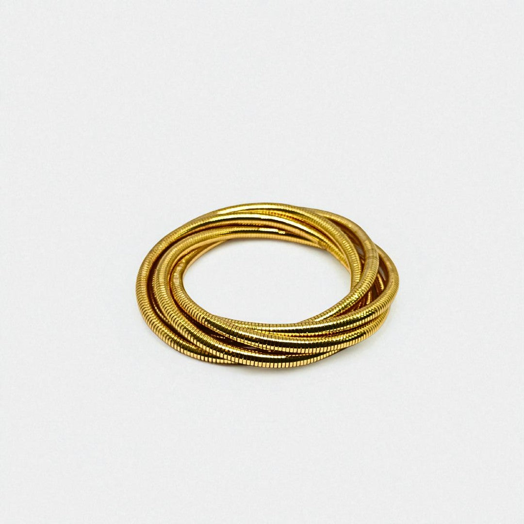 Stack of gold Bracelet for Women on a white background