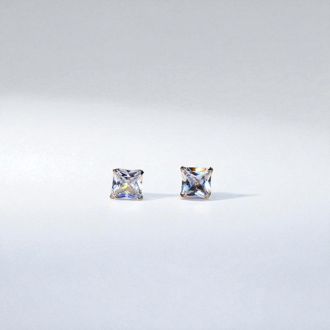 Two square-cut gemstones Studs Earrings for Women on a light gray background