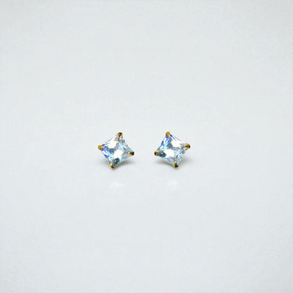 Pair of square-cut gemstone Stud Earrings for Women on a light gray background