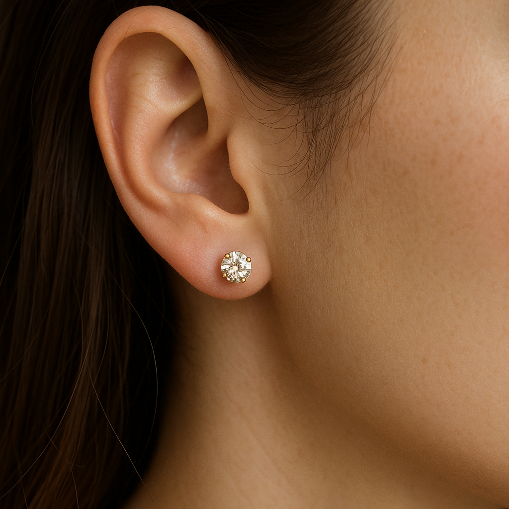 Close-up of an ear wearing a diamond Stud Earrings for Women with a dark background