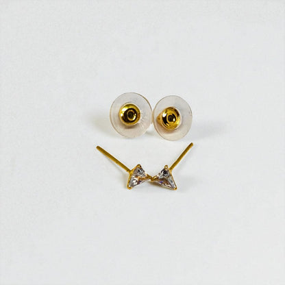 Gold triangle-shaped Stud Earrings for Women with clear gemstones on a white background