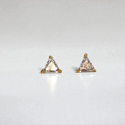 Pair of triangle-shaped Stud Earrings for Women on a light gray background