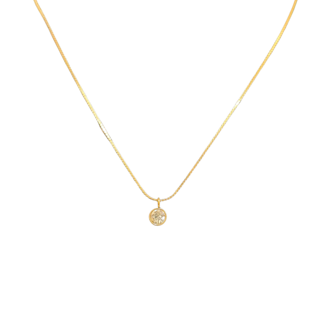 Gold necklace with a small round Pendant for Women on a white background
