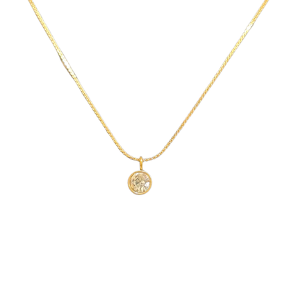 Gold necklace with a round Pendant for Women on a white background