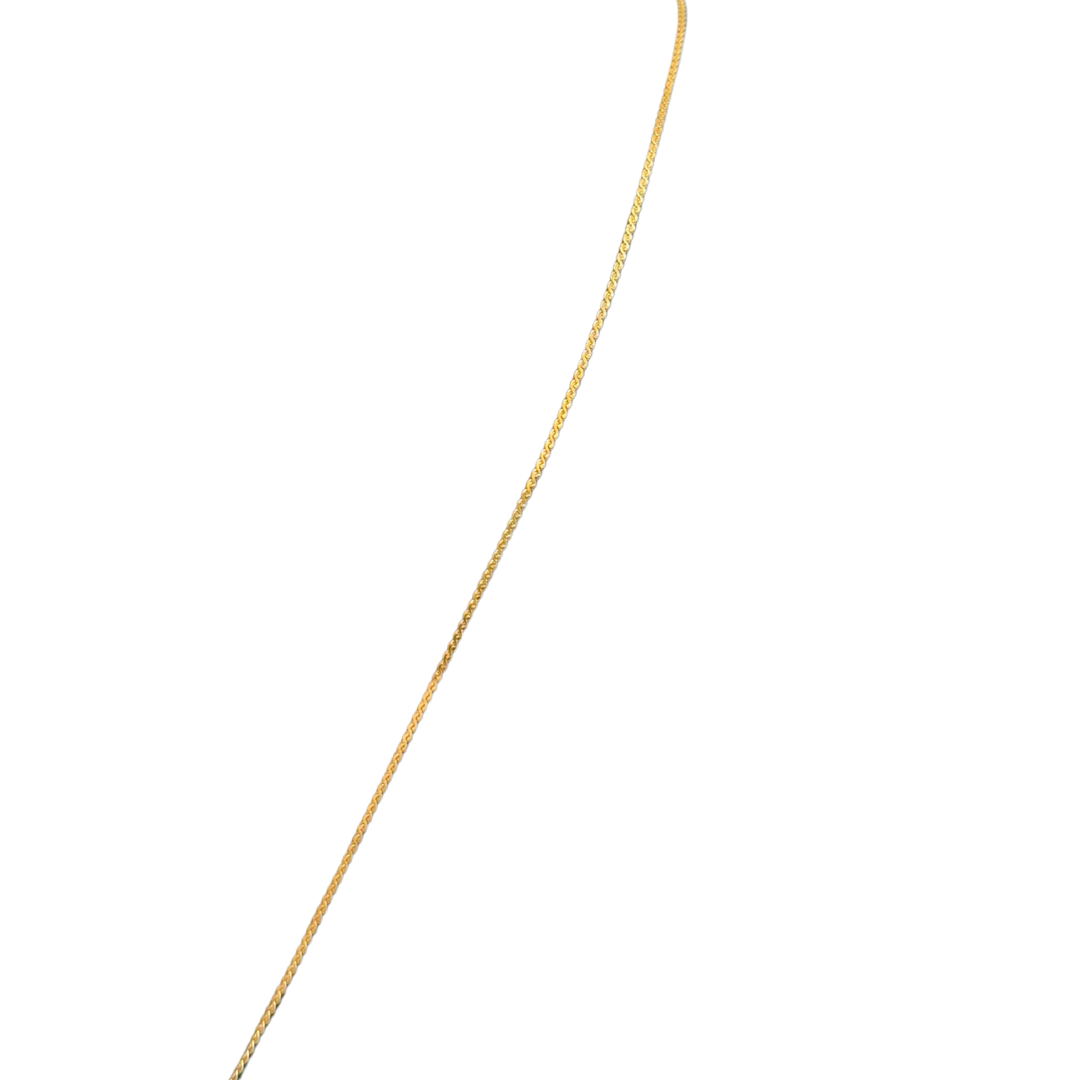 Gold plated chain on a white background