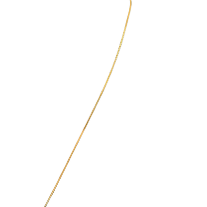 Gold plated chain on a white background