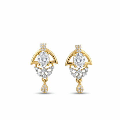 Gold and diamond earrings on a white background