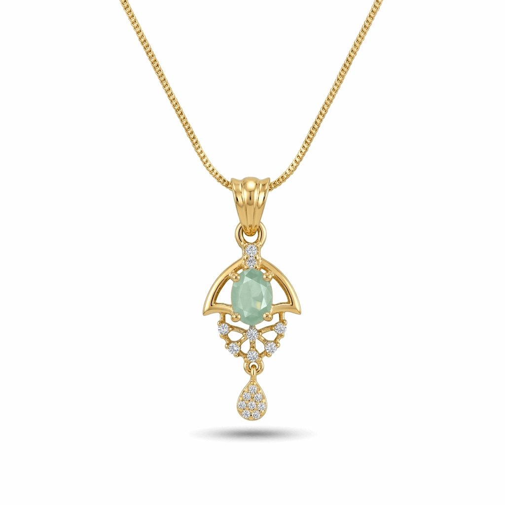 Gold pendant with a green gemstone on a white background