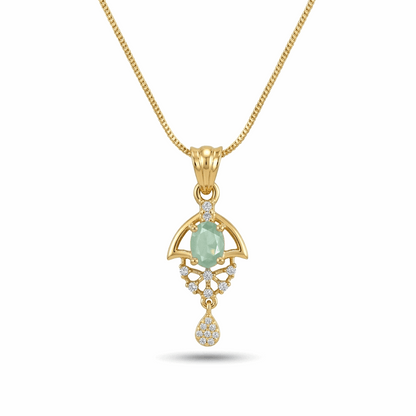 Gold pendant with a green gemstone on a white background