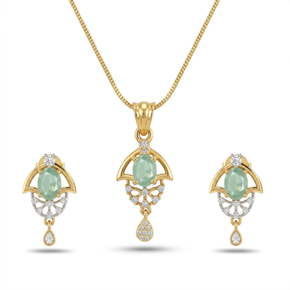 Gold jewelry set with green gemstones on a white background