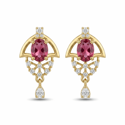 Gold earrings with red gemstones and diamond accents on a white background