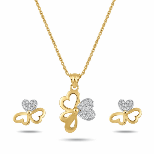 Gold and silver butterfly-shaped jewelry set with heart details on a white background