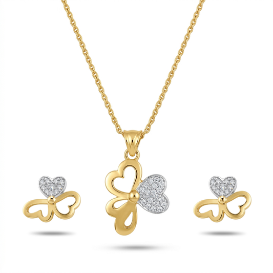 Gold and silver butterfly-shaped jewelry set with heart details on a white background