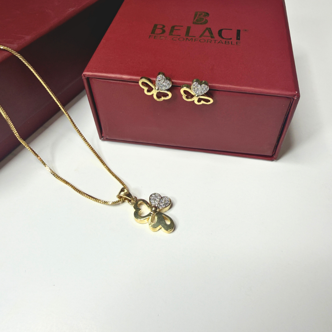 Gold butterfly necklace and earrings with BELACI box in the background