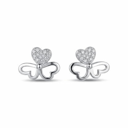 Butterfly-shaped earrings with heart details on a white background