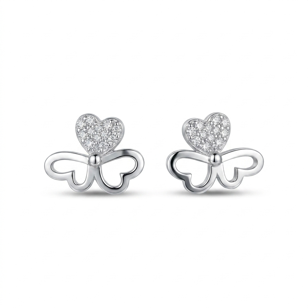 Butterfly-shaped earrings with heart details on a white background