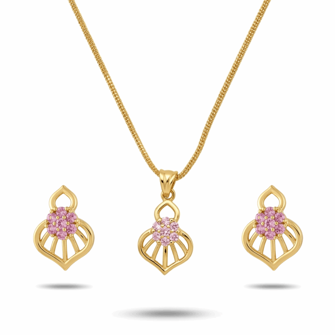Gold necklace and earrings with pink gemstones on a white background