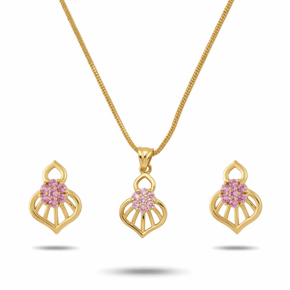 Gold necklace and earrings with pink gemstones on a white background