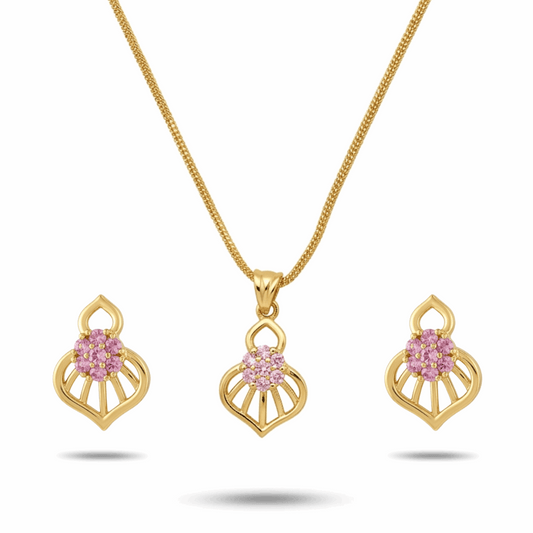 Gold necklace and earrings with pink gemstones on a white background