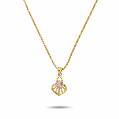 Gold necklace with a pink gemstone pendant on a white background