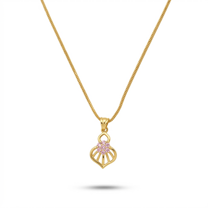 Gold necklace with a pink gemstone pendant on a white background