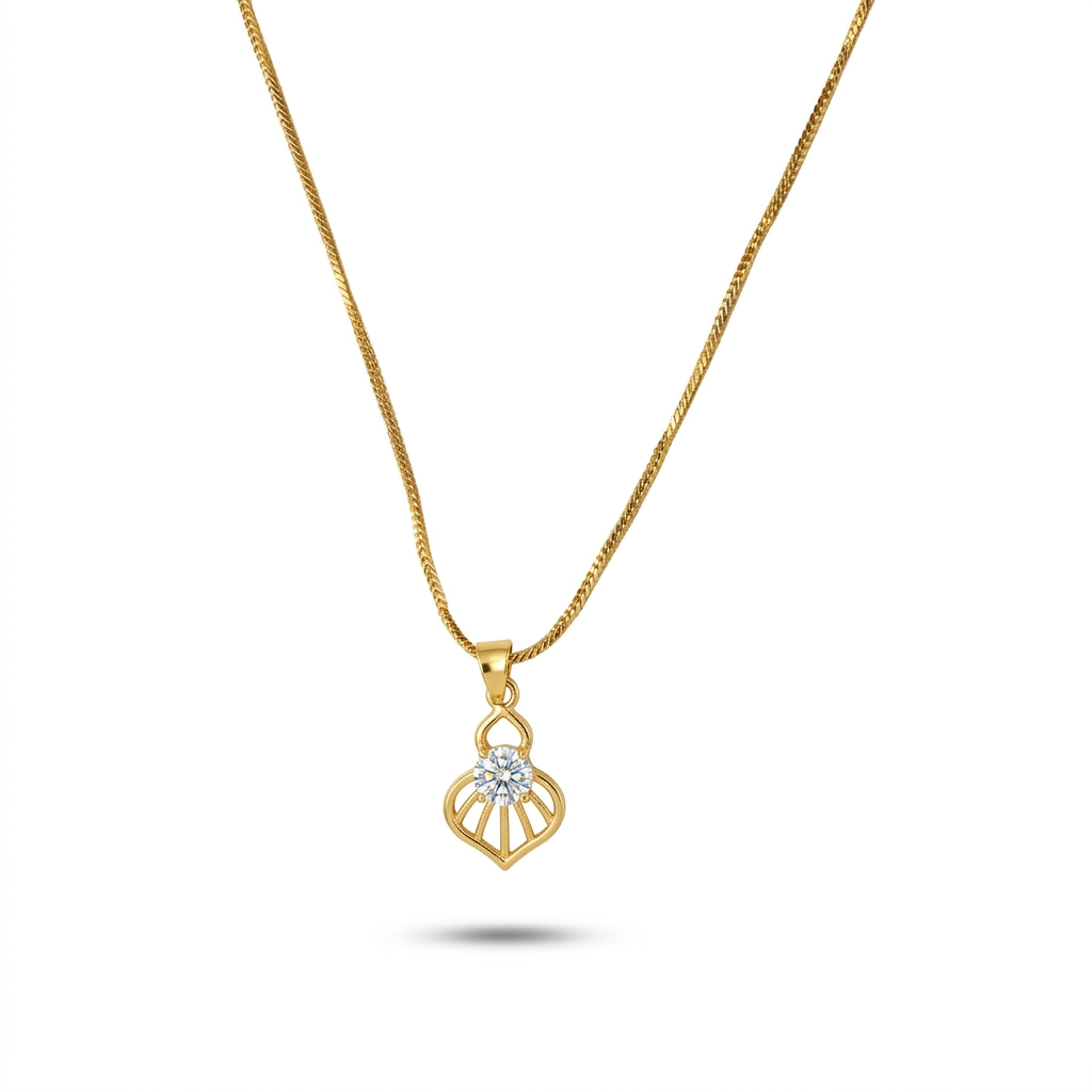 Gold necklace with a heart-shaped pendant on a white background