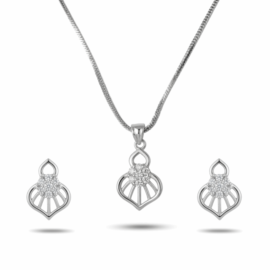 Silver jewelry set with heart-shaped pendant and earrings on a white background