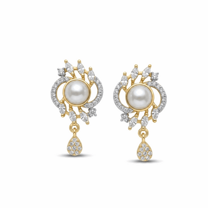Gold and pearl earrings on a white background