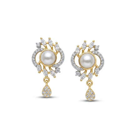 Gold and pearl earrings on a white background
