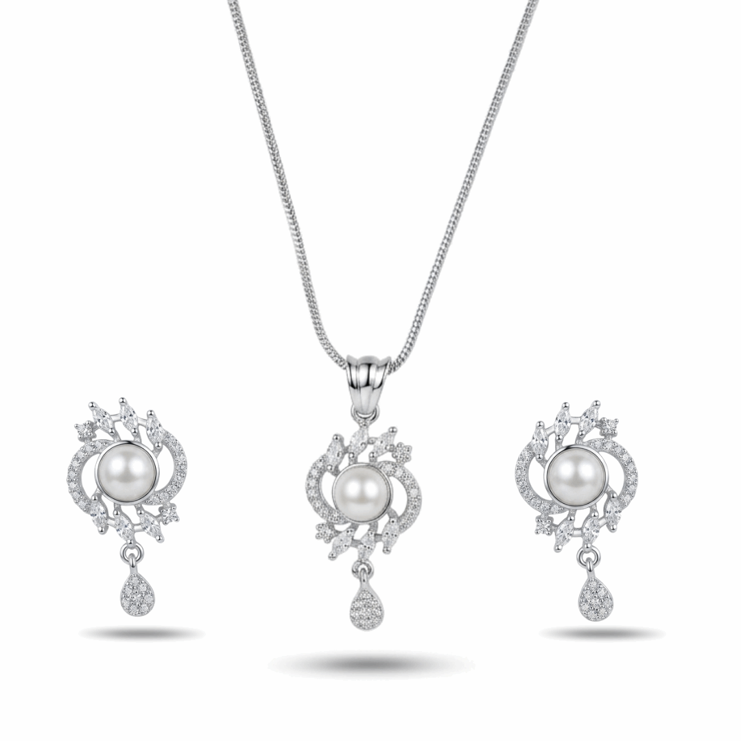 Pearl necklace and earrings set on a white background