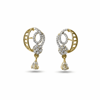 Gold and diamond earrings on a white background
