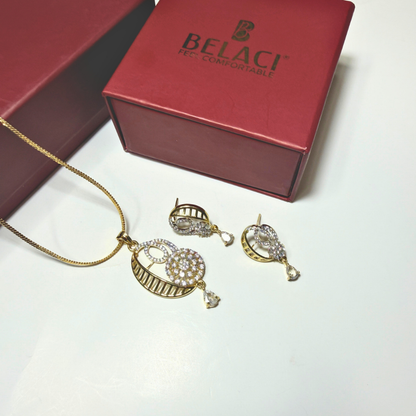 Gold necklace and earrings with BELACI jewelry box on a white background