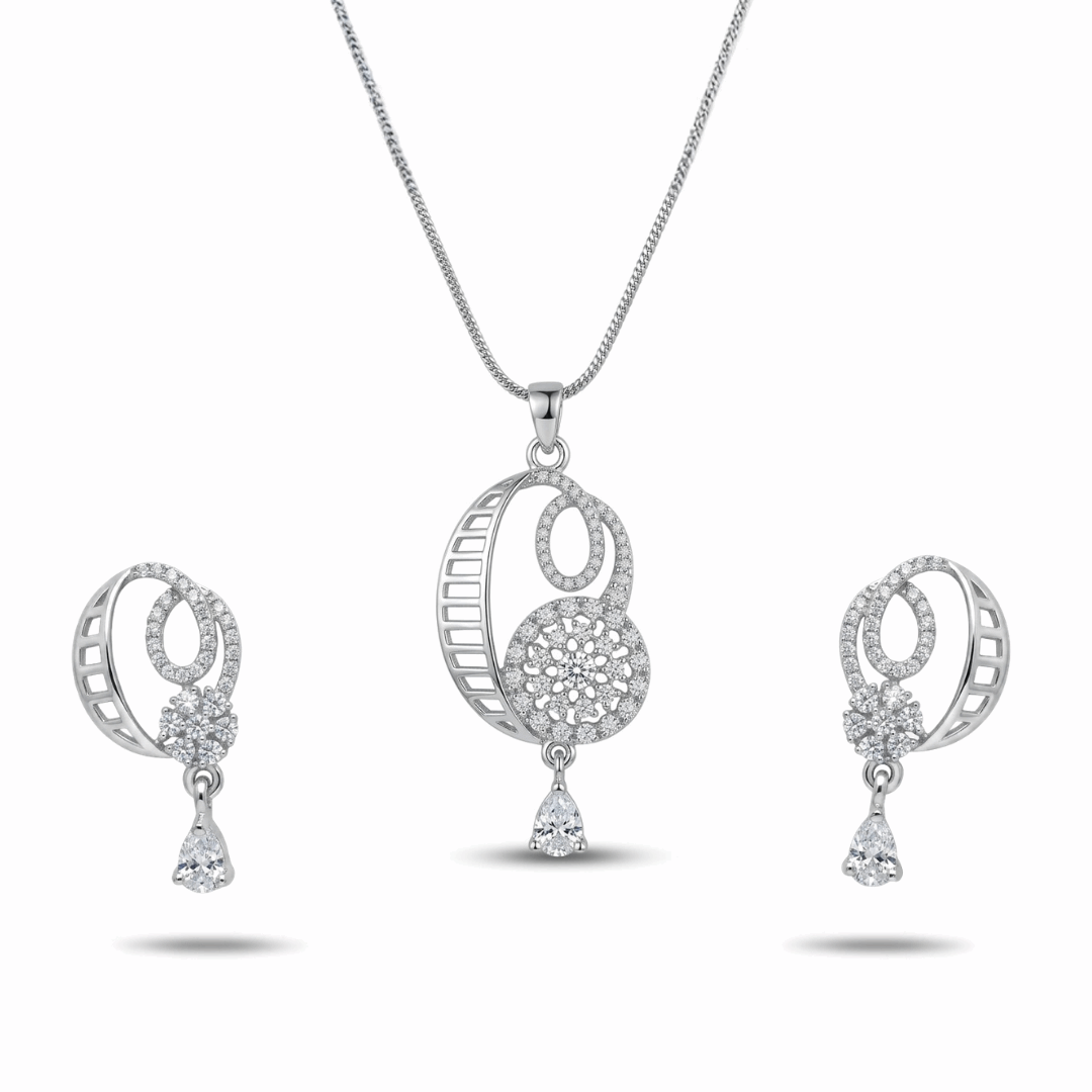 Silver jewelry set with necklace, ring, and earrings on a white background