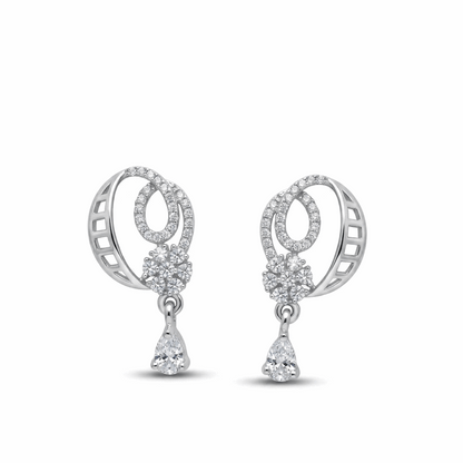 Pair of silver earrings with circular designs and teardrop-shaped elements on a white background