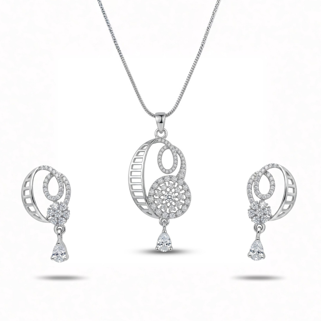 Silver jewelry set with necklace, ring, and earrings on a white background