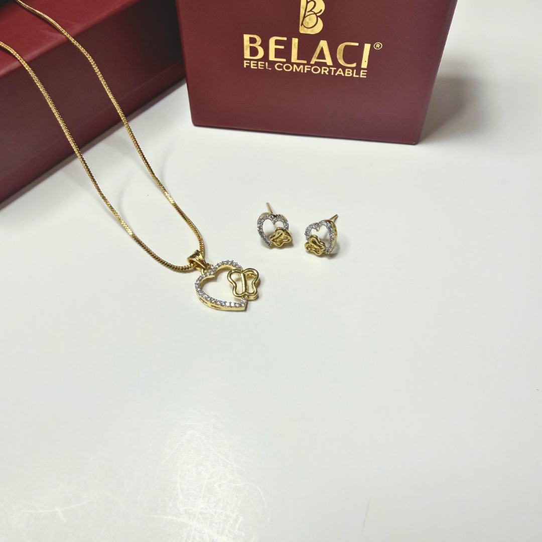 Gold necklace and earrings with BELACI box on a white surface