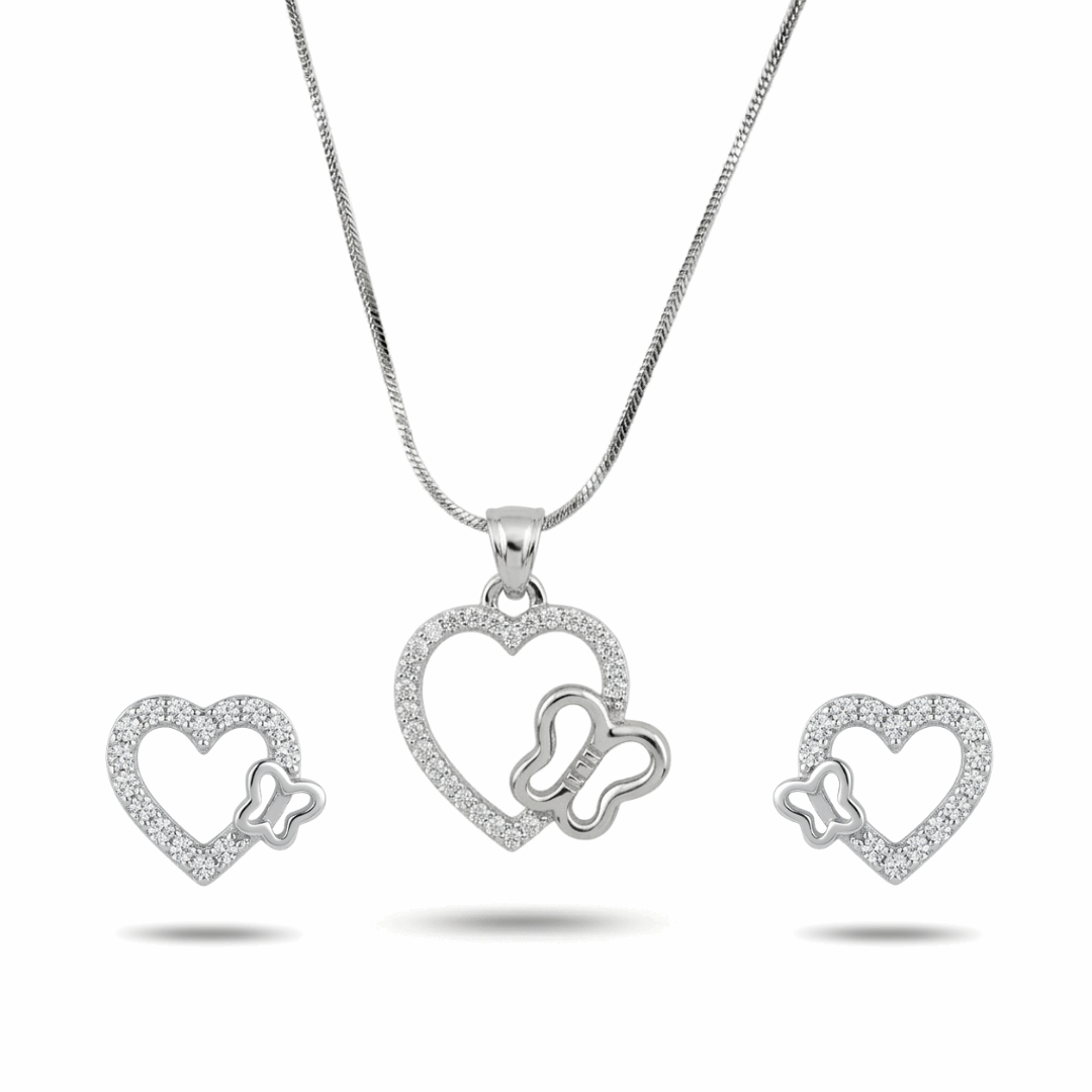 Silver heart-shaped jewelry set with butterfly design on a white background