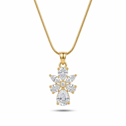 Gold necklace with a diamond pendant on a white background