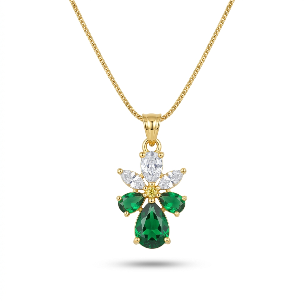 Gold necklace with a green gemstone pendant on a white background