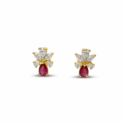 Pair of gold and pearl earrings on a white background