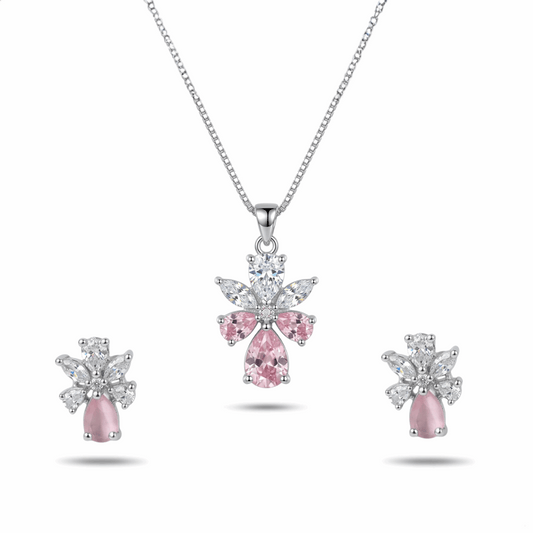 Jewelry set with pink gemstone pendant and earrings on a white background