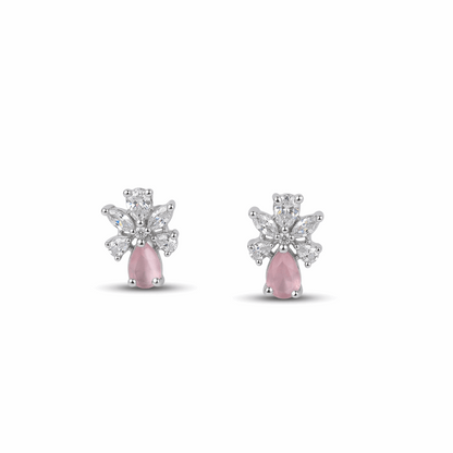 Pair of earrings with pink gemstones and diamond-like elements on a white background