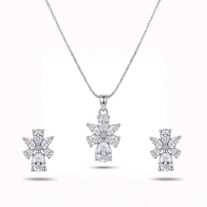 Diamond necklace and earrings set on a white background