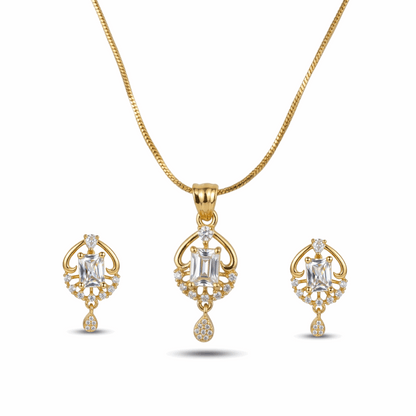 Gold necklace and earrings set on a white background