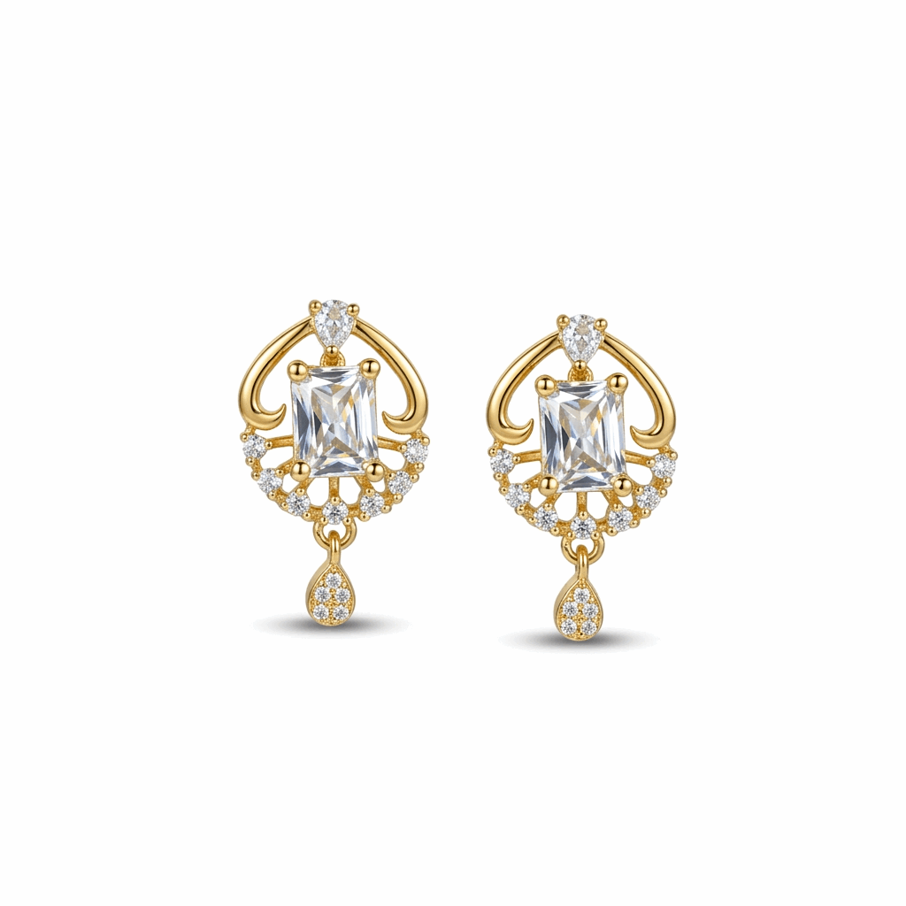 Gold earrings with clear gemstones on a white background