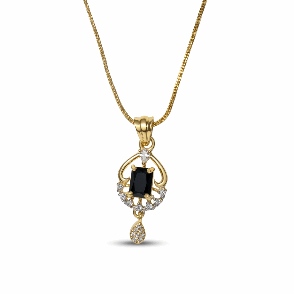 Gold pendant with a black gemstone on a white background