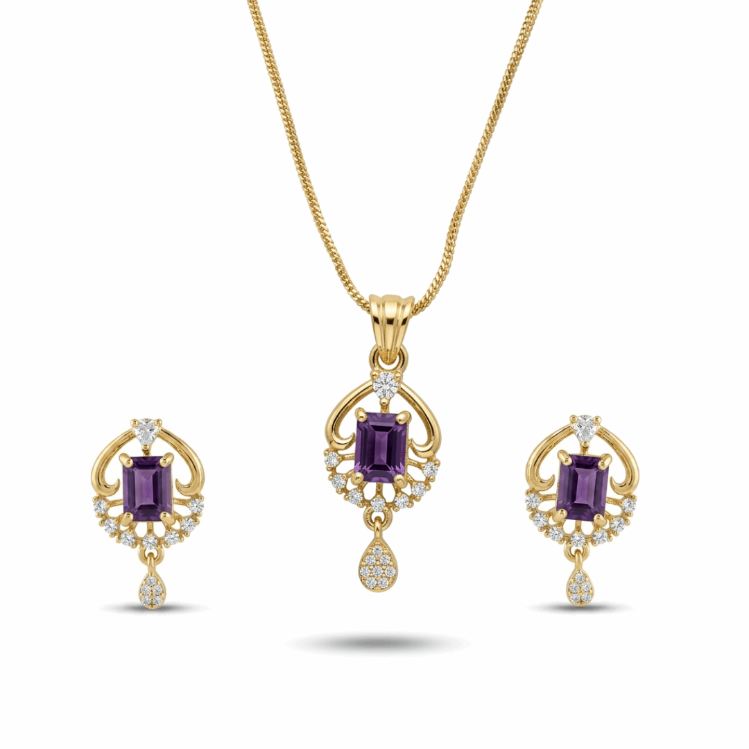 Gold jewelry set with purple gemstones on a white background