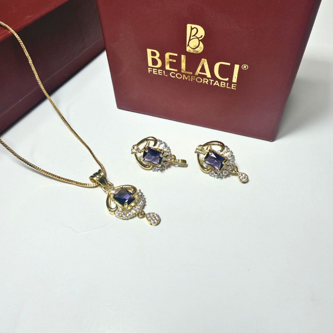 Jewelry set with necklace and earrings in front of a Belaci box.